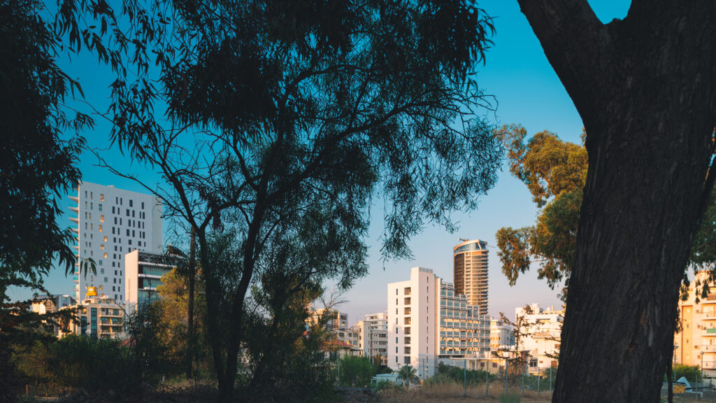 Nicosia modern architecture behind tree branches